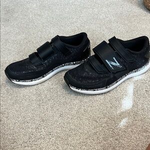 New Balance women’s  Black and White Sneakers- cycling shoes